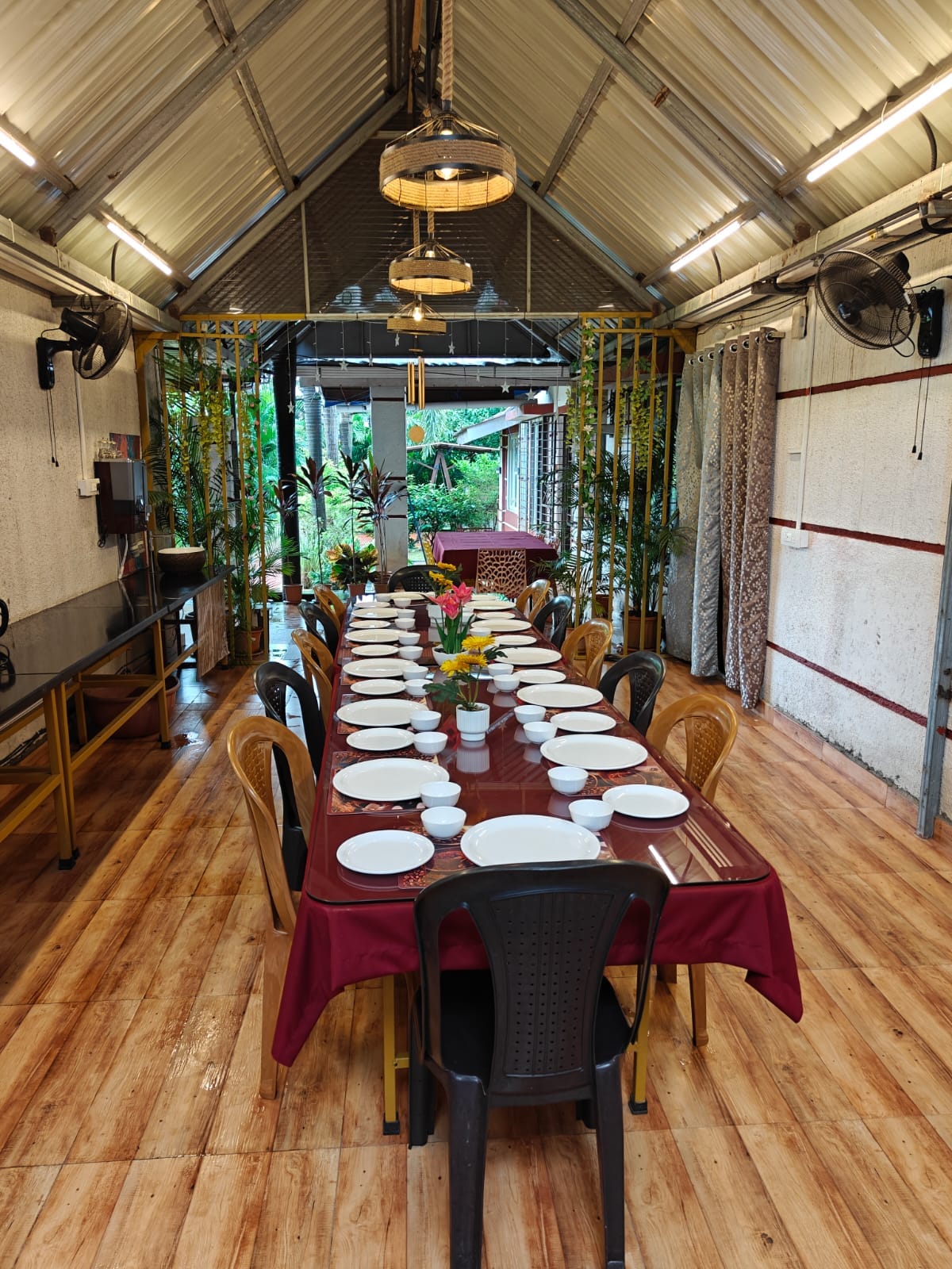 Dining room at Madhuson Palms family homestay with homely Maharashtrian food